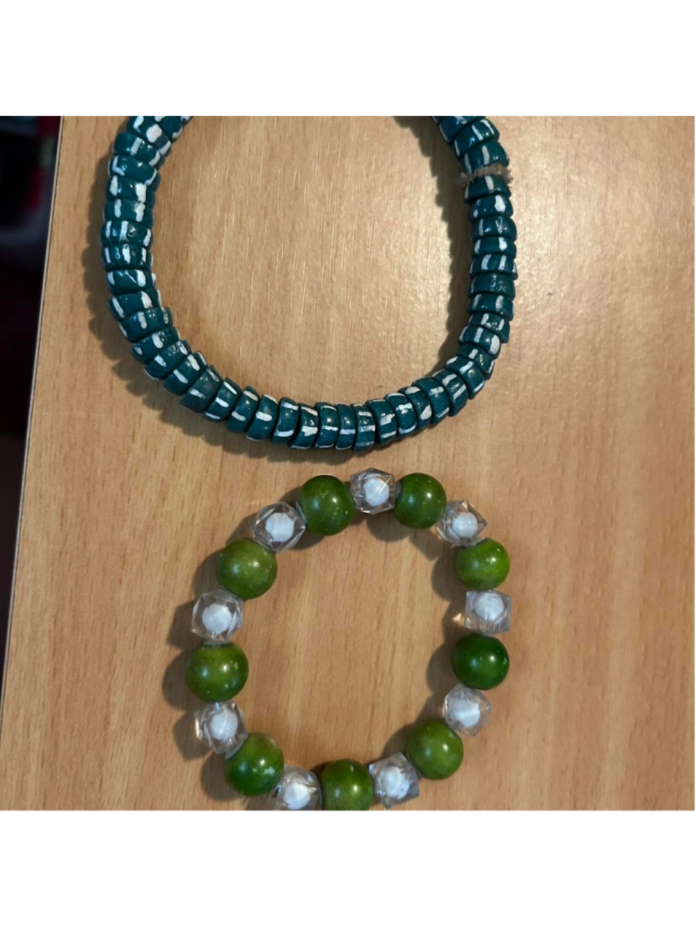 Green and blue beaded bracelets #jewellery
Handmade in Ghana 
Set of two